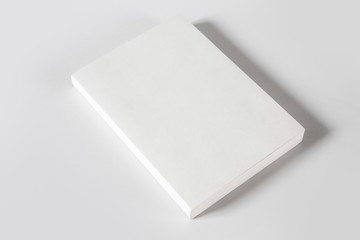 Closed blank book isolated on grey