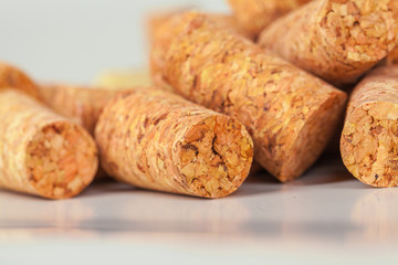 Heap of used vintage wine corks close-up