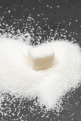 Group of refined white sugar cubes close up