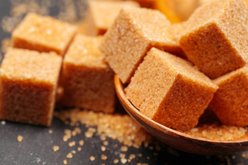 Rock sugar on dark background close up