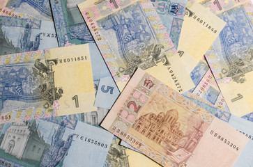 Ukrainian money. Hryvnia paper bill. Small paper notes. Cash. Background texture.