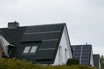 red tiled roof with solar panels, photovoltaic plant