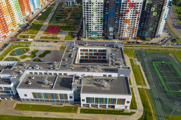 Obraz na płótnie Canvas MOSCOW, RUSSIA - MAY 26, 2019: Top view of the new colorful residential area of Moscow on a summer evening