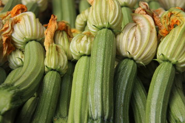 Fresh Young Green Zucchini With Flowers On Local Vegetable Market. Corfu Island  Greece