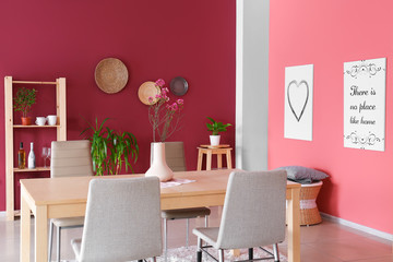 Big table in stylish interior of room