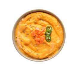Bowl of tasty cream soup on white background