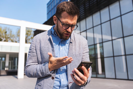 Disappointed Businessman With A Phone