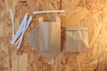 Clip band for paper bags packaging, how to close kraft paper bag, a step-by-step photo set.