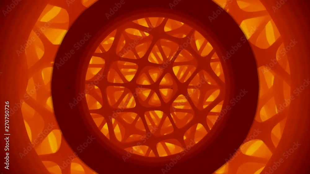 Fototapete futuristic composition of rotation rounded shapes. computer generated abstract animation with orange
