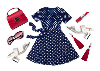Summer dress and various female accessories isolated on white background