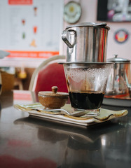 Hot coffee dripping milk in Vietnam style. 