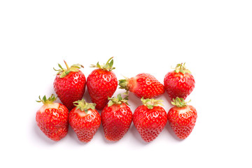 Fototapeta na wymiar Strawberry creative pattern. Ripe red berry on white background