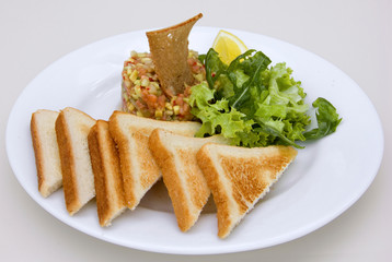 toasts and salad with greens and lemon, restaurant, white sack, white background