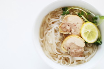 Vietnamese food, chciken and rice noodles with lemon