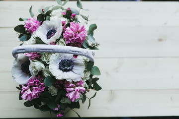 Fototapeta na wymiar Beautiful bouquet of flowers in a basket