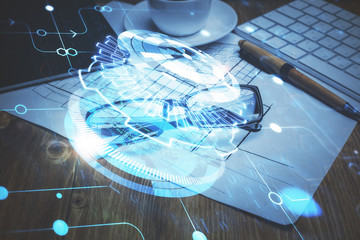 Data tech hologram with glasses on the table background. Concept of technology. Double exposure.