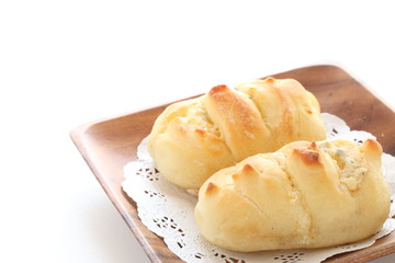 homemade cheese bread on wooden plate