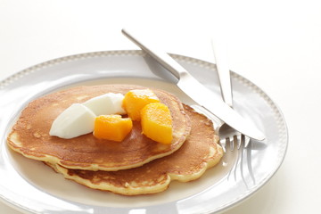 Frozen mango on panccake with copy space