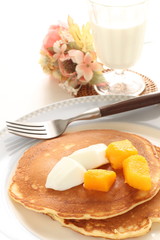 Frozen mango on panccake with copy space