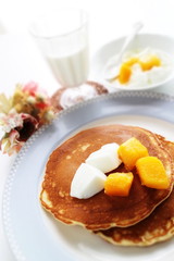 Frozen mango on panccake with copy space