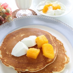 Frozen mango on panccake with copy space