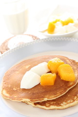 Frozen mango on panccake with copy space