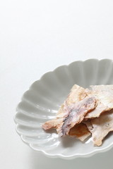 Obraz na płótnie Canvas Japanese food, squid senbei snack on dish