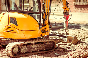 yellow bulldozer working in public work