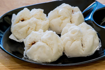 Homemade soft and white Xiaolongbao Dumplings filling with chicken sauce