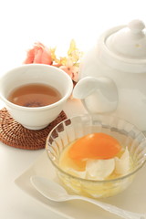 Chinese dessert, peach and almond tofu on glass bowl