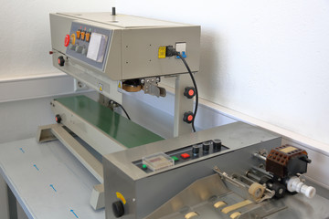 Industrial equipment for professional packaging in the factory shop