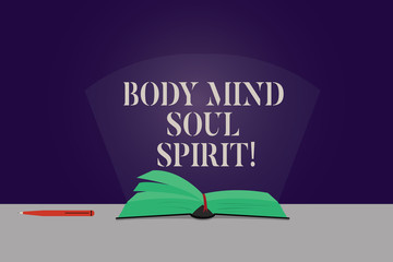 Word writing text Body Mind Soul Spirit. Business concept for Healthy lifestyle emotional balance Spiritual feelings Color Pages of Open Book photo on Table with Pen and Light Beam Glaring