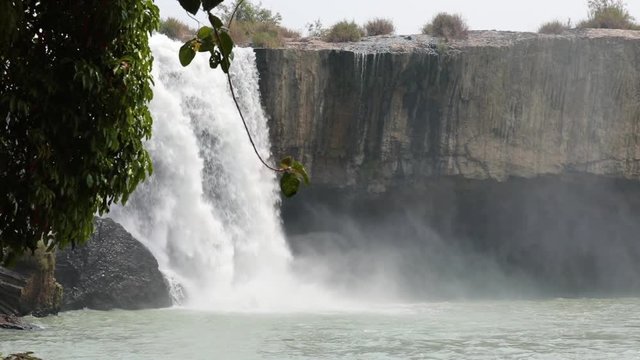 Beautiful waterfalls in Vietnam in the wild. slow motion. Asian nature. Dray Nur waterfall.