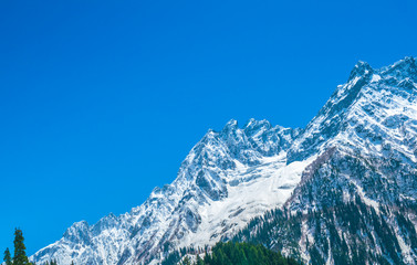 Fototapeta na wymiar Beautiful snow covered mountains landscape Kashmir state, India .