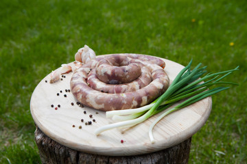 delicious juicy delicious home-made sausage raw for cooking