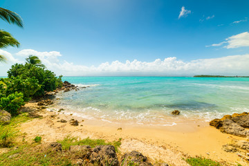 Clear water and blue sky in Bas du Fort beach in Guadeloupe
