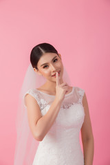 Beautiful asian bride portrait in pink studio - 270768559