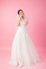 Beautiful asian bride portrait in pink studio - 270768710