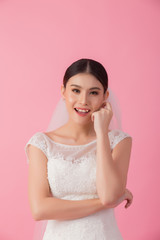 Beautiful asian bride portrait in pink studio - 270768711