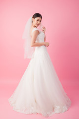 Beautiful asian bride portrait in pink studio - 270768733