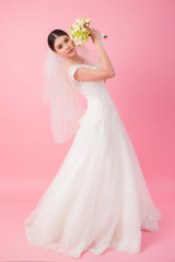 Beautiful asian bride portrait in pink studio - 270768786