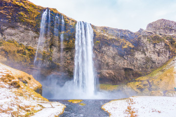 Beautiful famous waterfall in Iceland, winter season .