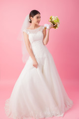 Beautiful asian bride portrait in pink studio - 270771116