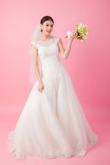 Beautiful asian bride portrait in pink studio - 270771120
