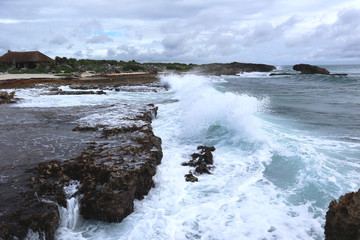 waves crashing on rocks