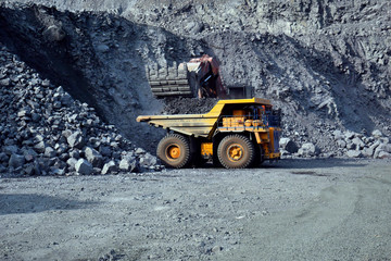 quarry excavator and truck