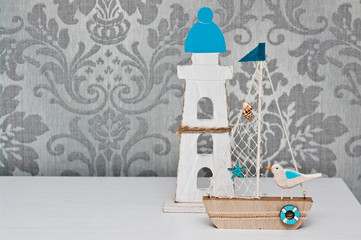 Lighthouse and boat wooden toys abstract background