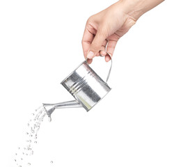 hand holding a small metal watering can with spout isolated on white background © cloud7days