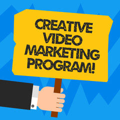 Word writing text Creative Video Marketing Program. Business concept for Online modern advertising promotion ideas Hu analysis Hand Holding Blank Colored Placard with Stick photo Text Space