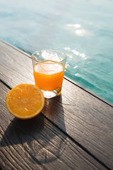 Orange juice around a swimming pool